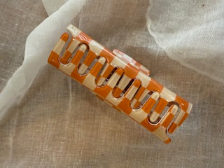 AURYN - Stylische orange Karo-Haarklammern