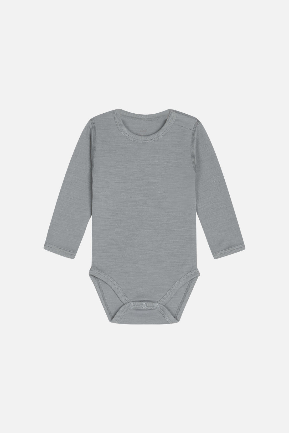 Einfarbiger Body aus weicher Stretch-Merinowolle von Hust & Claire. Popper-Verschlüsse an der linken Schulter und zwischen den Beinen.