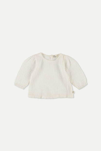 Bluse aus weicher Musselin mit langen Ärmel, Rundhalsausschnitt und geraffte Details vorne und an den Schultern.