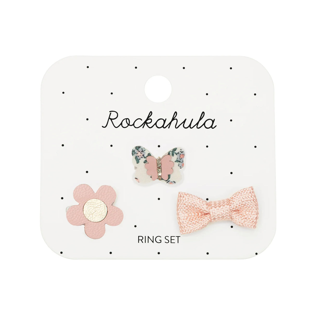 Dieses süße Set aus drei Ringen enthält unseren Flora-Schmetterling, eine schimmernde Schleife und ein PU-Disy. Jeder Ring ist für kleine Finger verstellbar.